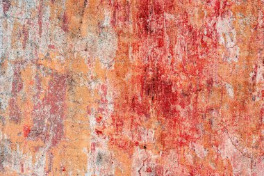 Çatlakları ve çizikleri olan beton bir duvarın dokusu arka plan olarak kullanılabilir.