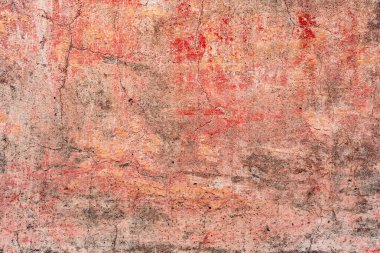 Çatlakları ve çizikleri olan beton bir duvarın dokusu arka plan olarak kullanılabilir.