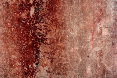 Çatlakları ve çizikleri olan beton bir duvarın dokusu arka plan olarak kullanılabilir.