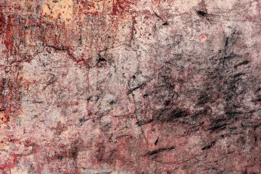 Çatlakları ve çizikleri olan beton bir duvarın dokusu arka plan olarak kullanılabilir.