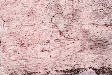 Çatlakları ve çizikleri olan beton bir duvarın dokusu arka plan olarak kullanılabilir.