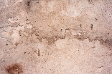Doku, duvar, beton, arka plan olarak kullanılabilir. Çizik ve çatlaklarla dolu bir duvar parçası.