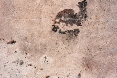 Doku, duvar, beton, arka plan olarak kullanılabilir. Çizik ve çatlaklarla dolu bir duvar parçası.