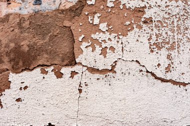 Doku, duvar, beton, arka plan olarak kullanılabilir. Çizik ve çatlaklarla dolu bir duvar parçası.