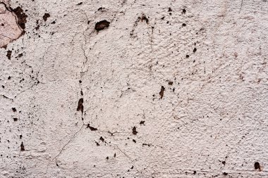 Doku, duvar, beton, arka plan olarak kullanılabilir. Çizik ve çatlaklarla dolu bir duvar parçası.