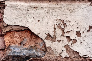 Doku, duvar, beton, arka plan olarak kullanılabilir. Çizik ve çatlaklarla dolu bir duvar parçası.