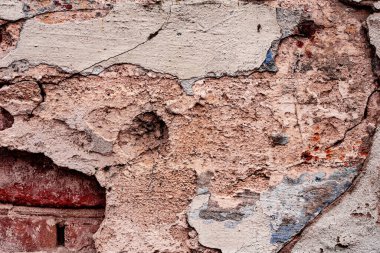 Doku, duvar, beton, arka plan olarak kullanılabilir. Çizik ve çatlaklarla dolu bir duvar parçası.
