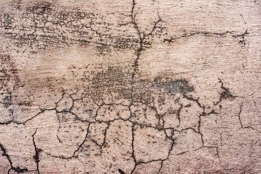 Doku, duvar, beton, arka plan olarak kullanılabilir. Çizik ve çatlaklarla dolu bir duvar parçası.