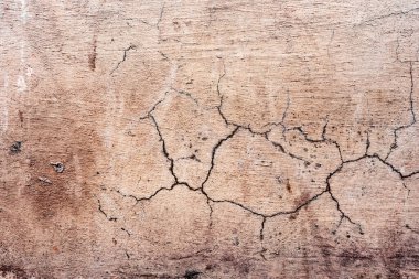 Doku, duvar, beton, arka plan olarak kullanılabilir. Çizik ve çatlaklarla dolu bir duvar parçası.