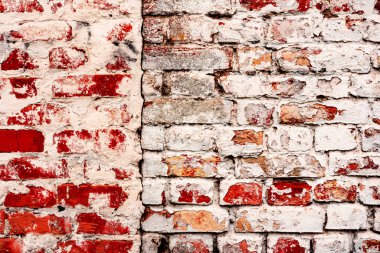Çatlakları ve çizikleri olan tuğla duvar dokusu arka plan olarak kullanılabilir.