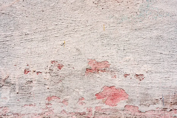 Doku, duvar, beton, arka plan olarak kullanılabilir. Çizik ve çatlaklarla dolu bir duvar parçası.