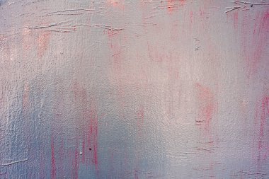 Çatlakları ve çizikleri olan metal bir duvarın dokusu arka plan olarak kullanılabilir.