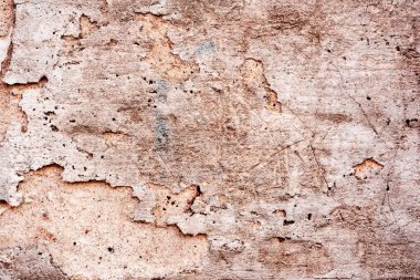 Doku, duvar, beton, arka plan olarak kullanılabilir. Çizik ve çatlaklarla dolu bir duvar parçası.