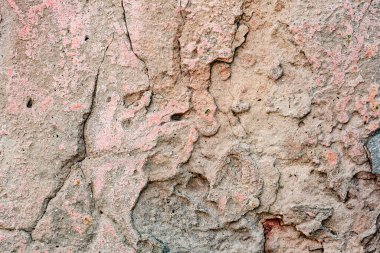 Doku, duvar, beton, arka plan olarak kullanılabilir. Çizik ve çatlaklarla dolu bir duvar parçası.