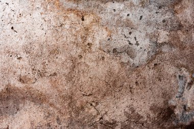 Doku, duvar, beton, arka plan olarak kullanılabilir. Çizik ve çatlaklarla dolu bir duvar parçası.