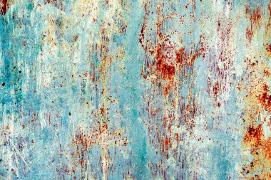 Çatlakları ve çizikleri olan metal bir duvarın dokusu arka plan olarak kullanılabilir.