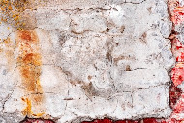 Doku, duvar, beton, arka plan olarak kullanılabilir. Çizik ve çatlaklarla dolu bir duvar parçası.