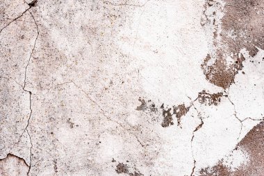 Doku, duvar, beton, arka plan olarak kullanılabilir. Çizik ve çatlaklarla dolu bir duvar parçası.