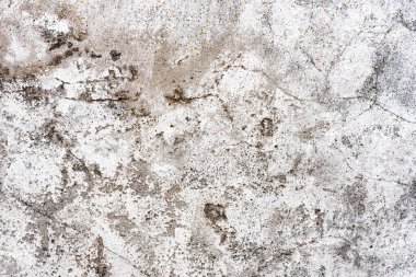 Doku, duvar, beton, arka plan olarak kullanılabilir. Çizik ve çatlaklarla dolu bir duvar parçası.