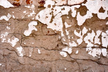 Doku, duvar, beton, arka plan olarak kullanılabilir. Çizik ve çatlaklarla dolu bir duvar parçası.