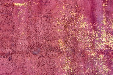 Çatlakları ve çizikleri olan metal bir duvarın dokusu arka plan olarak kullanılabilir.