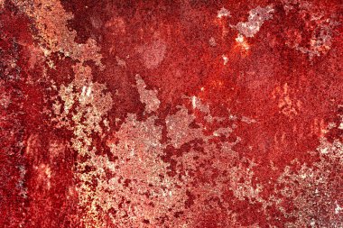 Çatlakları ve çizikleri olan metal bir duvarın dokusu arka plan olarak kullanılabilir.