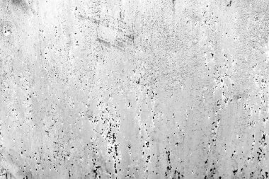 Çatlakları ve çizikleri olan metal bir duvarın dokusu arka plan olarak kullanılabilir.