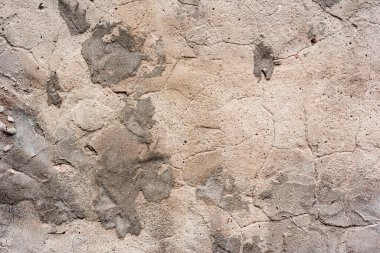 Doku, duvar, beton, arka plan olarak kullanılabilir. Çizik ve çatlaklarla dolu bir duvar parçası.