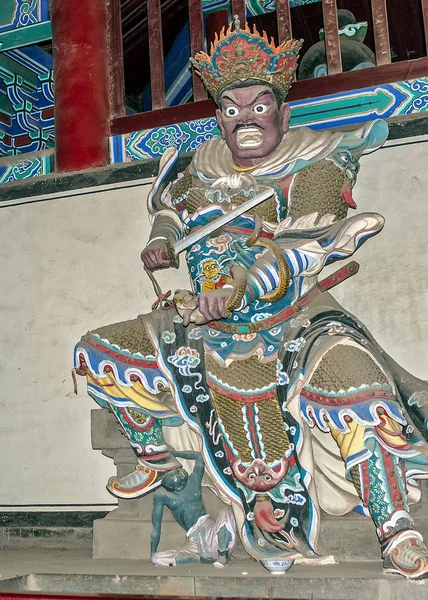 Himmlischer Herrscher virudhaka (mit einem Schwert)). — Stockfoto