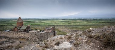 Panorama of the monastery Khor Virap on a rainy August day. clipart