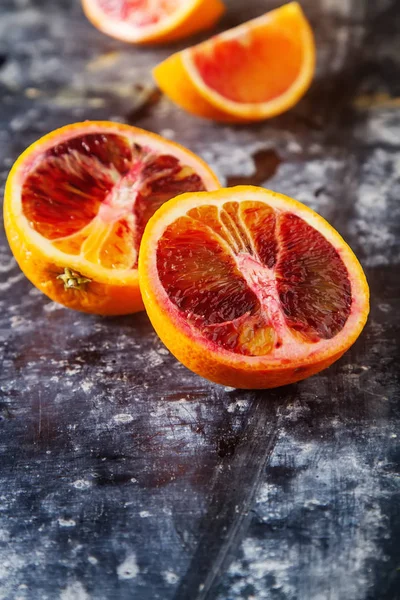 Citrus juice fruits Red orange. Vitamin C. Dark background. — Stock Photo, Image