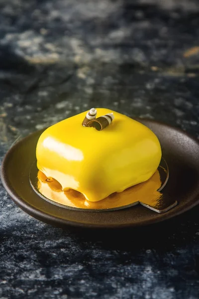 Trendy mousse cake with mirror glaze decorated. Dark background. — Stock Photo, Image