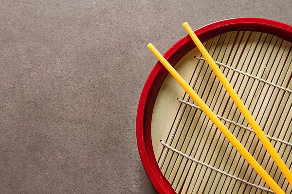 Chinese food. Two chopsticks for eating. Food sticks. Dark backg — Stock Photo, Image