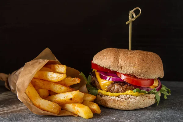 Fast food. Not a diet. Homemade vegetarian burger with rocket sa