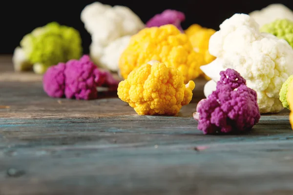 A rainbow of food. Purple cauliflower, orange cauliflower and br