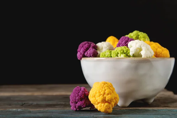 A rainbow of food. Purple cauliflower, orange cauliflower and br