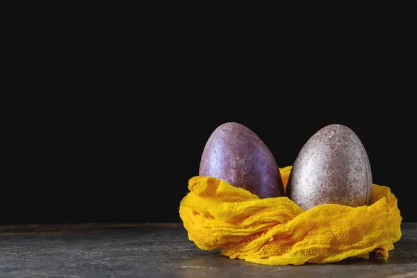 Easter holiday. Chocolate eggs. Dark background. — Stock Photo, Image