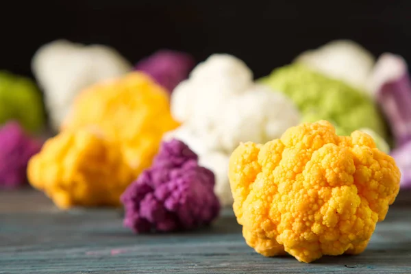 A rainbow of food. Purple cauliflower, orange cauliflower and br