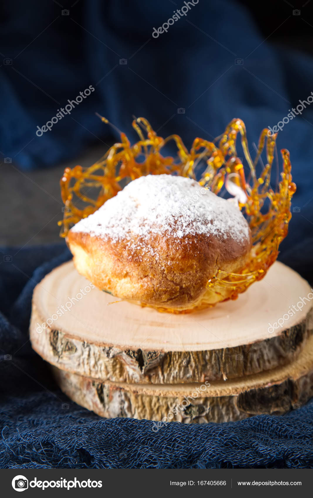 Italian Dessert Is Profiterole With Cream And Caramel Decoration