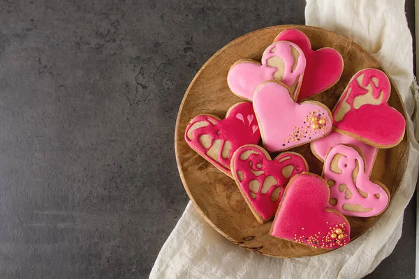 Heart cookie. St. Valentine\'s Day, Wedding. Dark background.