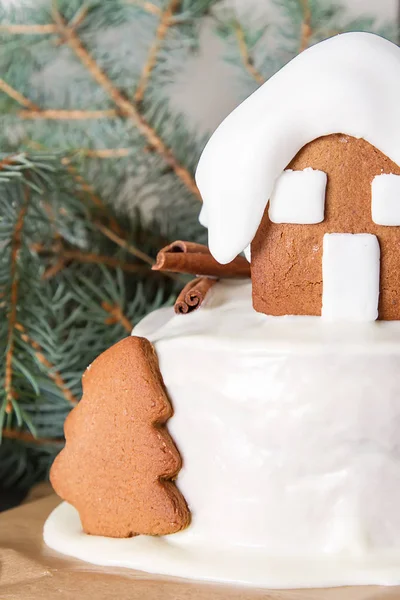 New Year cake with Christmas trees and gingerbread houses and ci