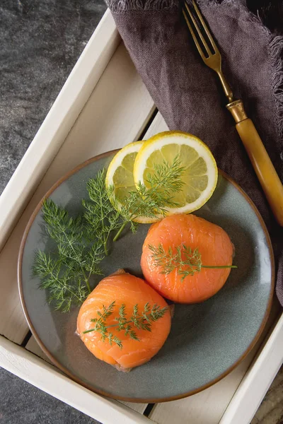 Smoked salmon, mousse, pate with dill and lemon. Dark background — Stock Photo, Image