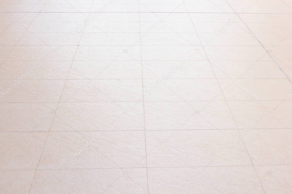 White tiles floor for background . Tiled marble floor