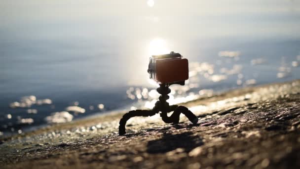 Concrete embankment with an action camera in waterproof case — Stock Video