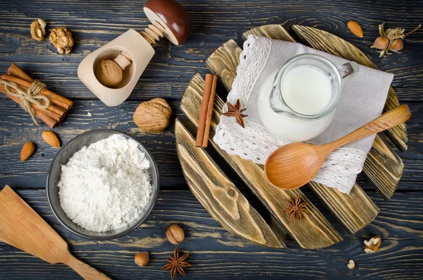 Ingredients for cooking baking. Flour, milk, nuts and spices — Stock Photo, Image