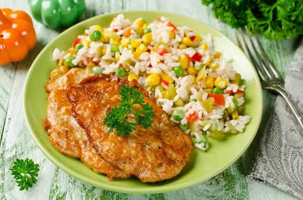 Chicken chops with rice and vegetables