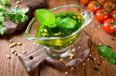 Green sauce Pesto with pine nuts clipart