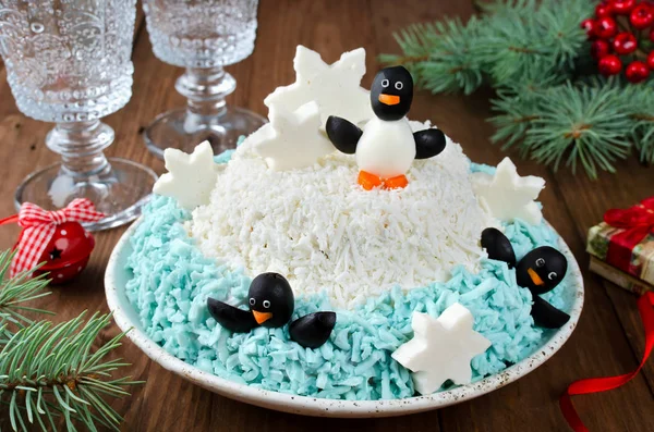 Festive salad penguins on an ice floe — Stock Photo, Image