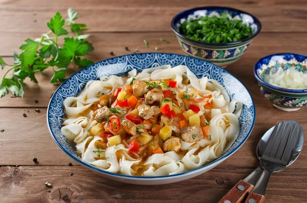 Uzbek lagman soup with noodles, meat and vegetables. Traditional Uzbek cuisine. — Stock Image Uzbek Lagman Soup Noodles Meat Vegetables Traditional Uzbek Cuisine Royalty Free Stock Images