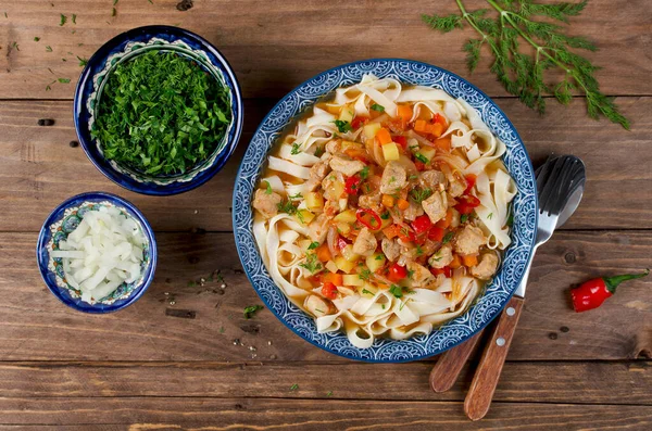 Uzbek lagman soup with noodles, meat and vegetables. Traditional Uzbek cuisine. — Stock Image Uzbek Lagman Soup Noodles Meat Vegetables Traditional Uzbek Cuisine Royalty Free Stock Photos